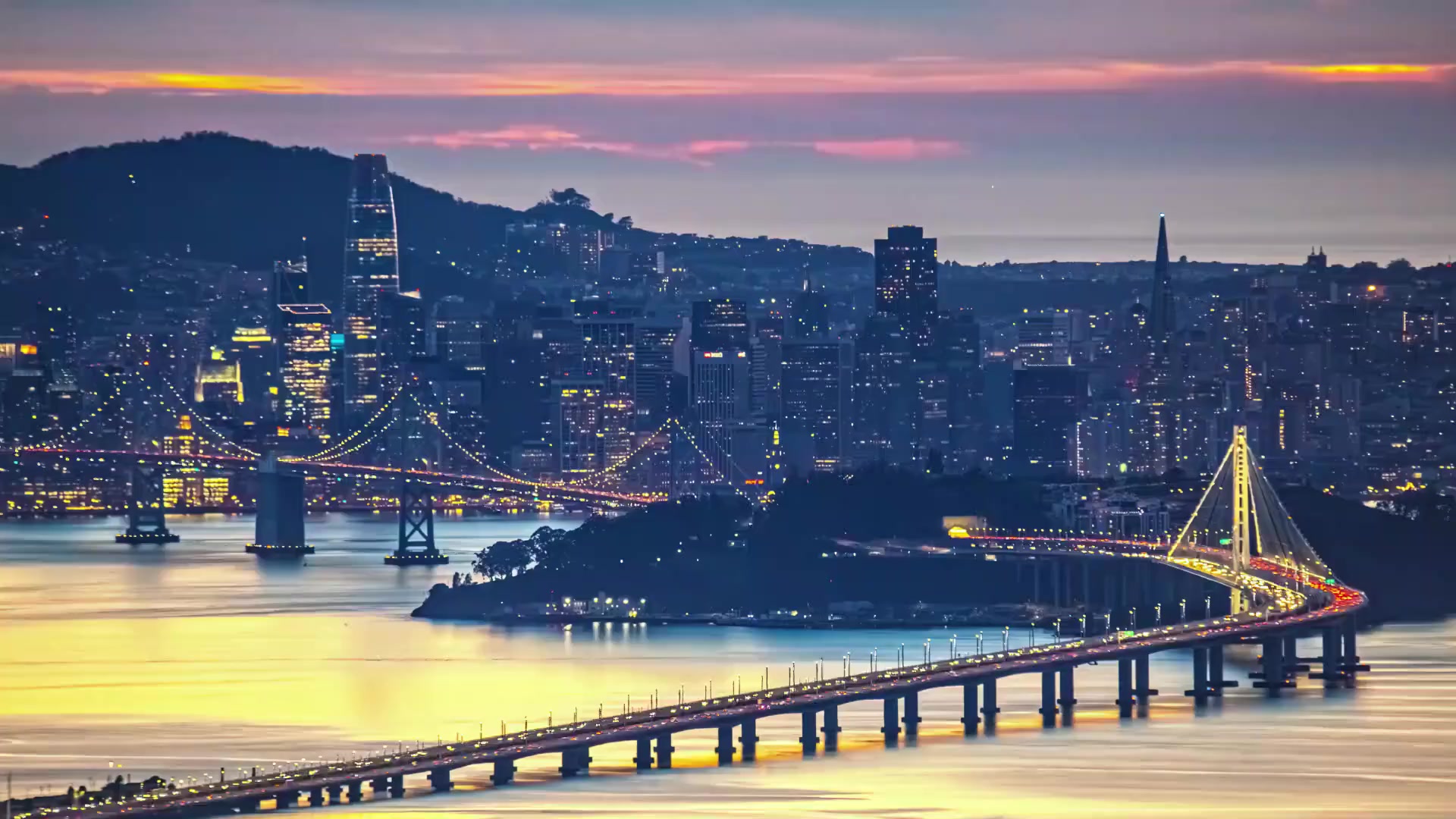 San Francisco skyline and Bay Bridge at dusk